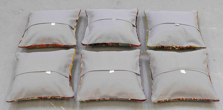 Six Anatolian "carpet cushions", around 40 x 40 cm.
