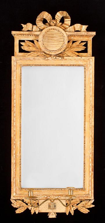 A late Gustavian two-light girandole mirror dated 1796.