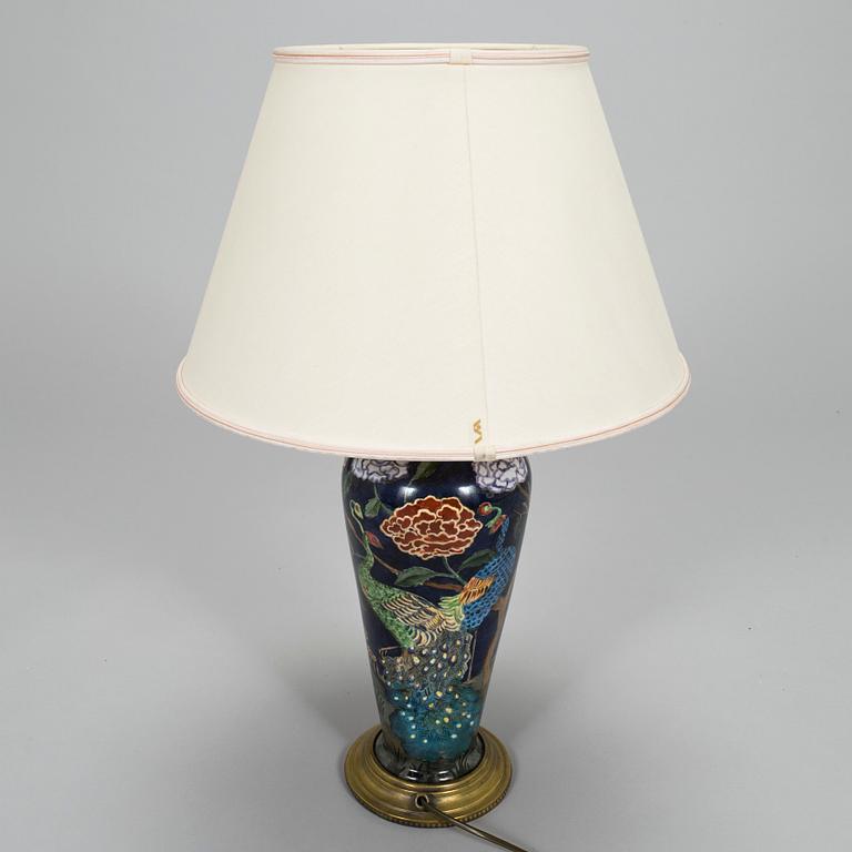 A painted porcelain table lamp, later part of the 20th century.