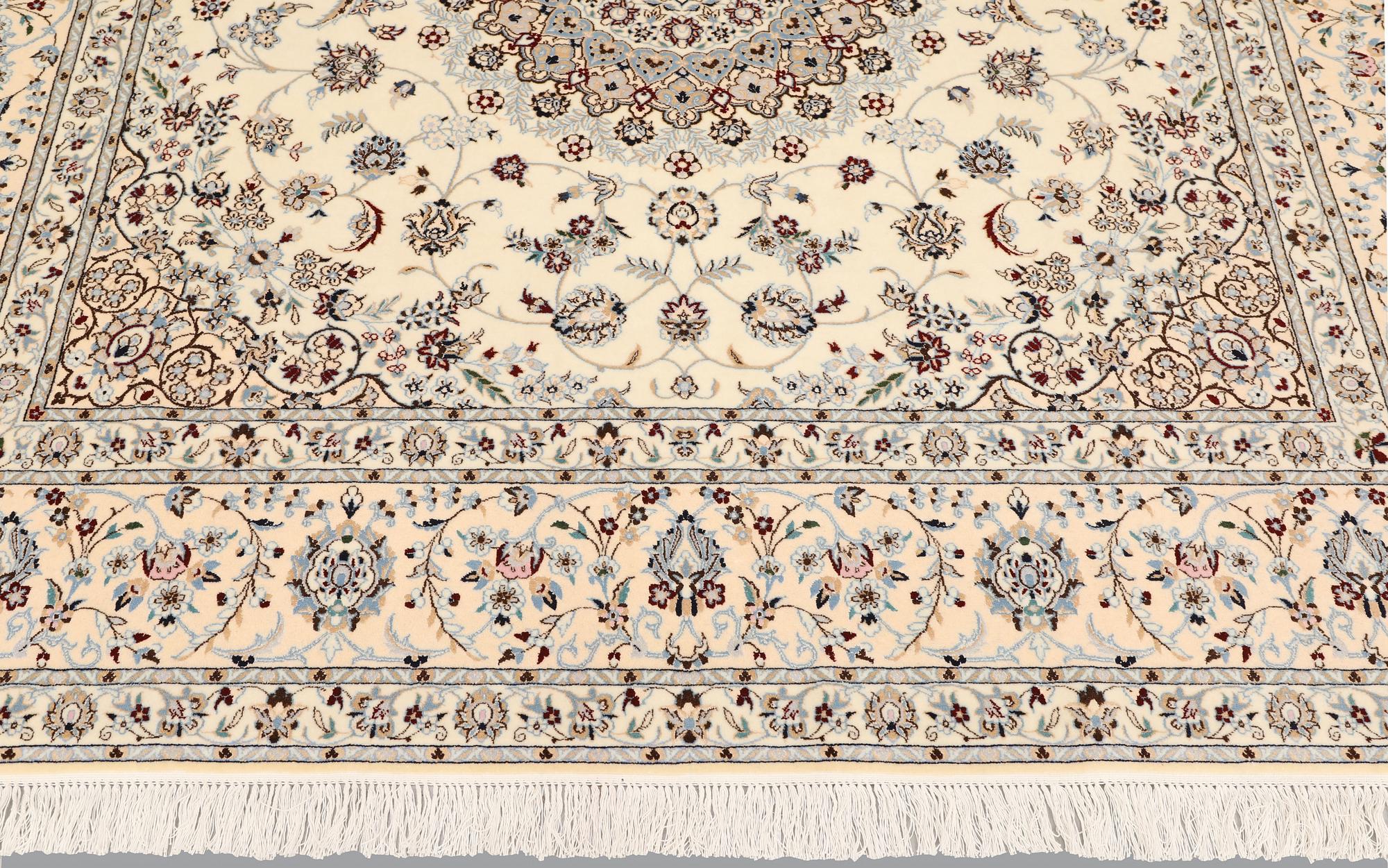A Nain part silk carpet, c. 207 x 208 cm.