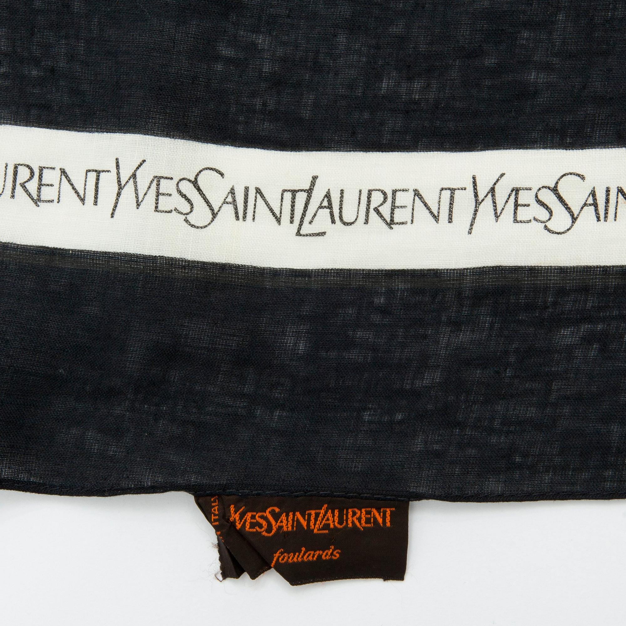 YVES SAINT LAURENT, a blue cotton blend shawl.