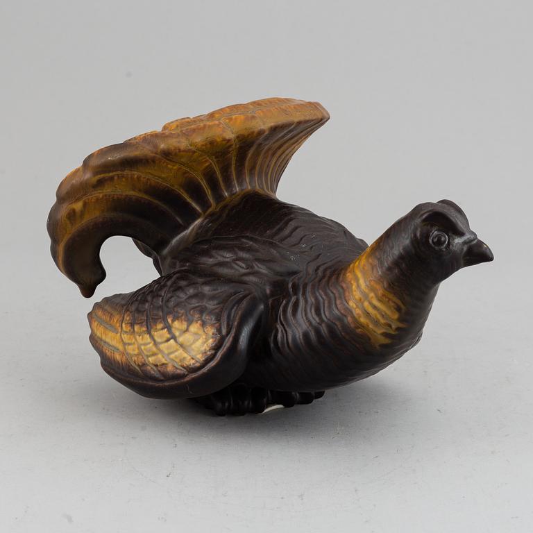 A Gunnar Nylund figure of a wood grouse, Rörstrand, 20th Century.