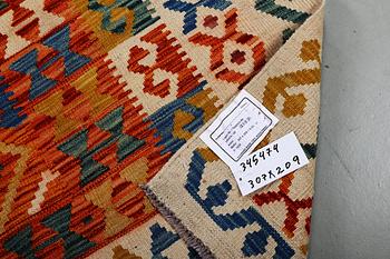 A carpet, Kilim, ca 307 x 209 cm.