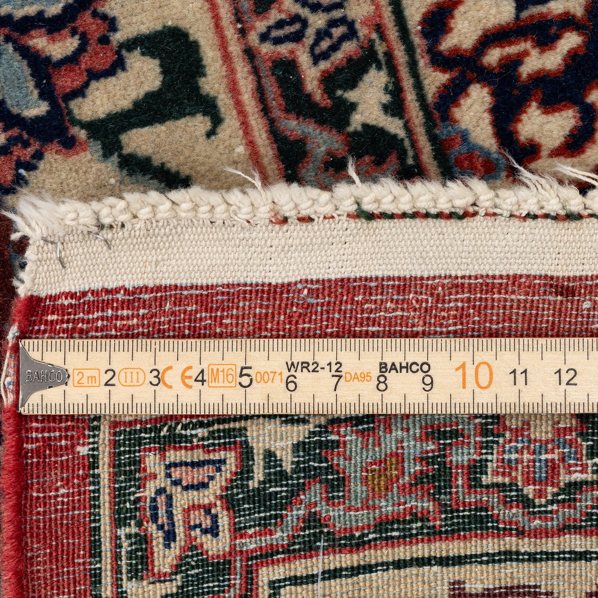 A semi-antique Isfahan carpet, central Iran, c. 325 x 210 cm.