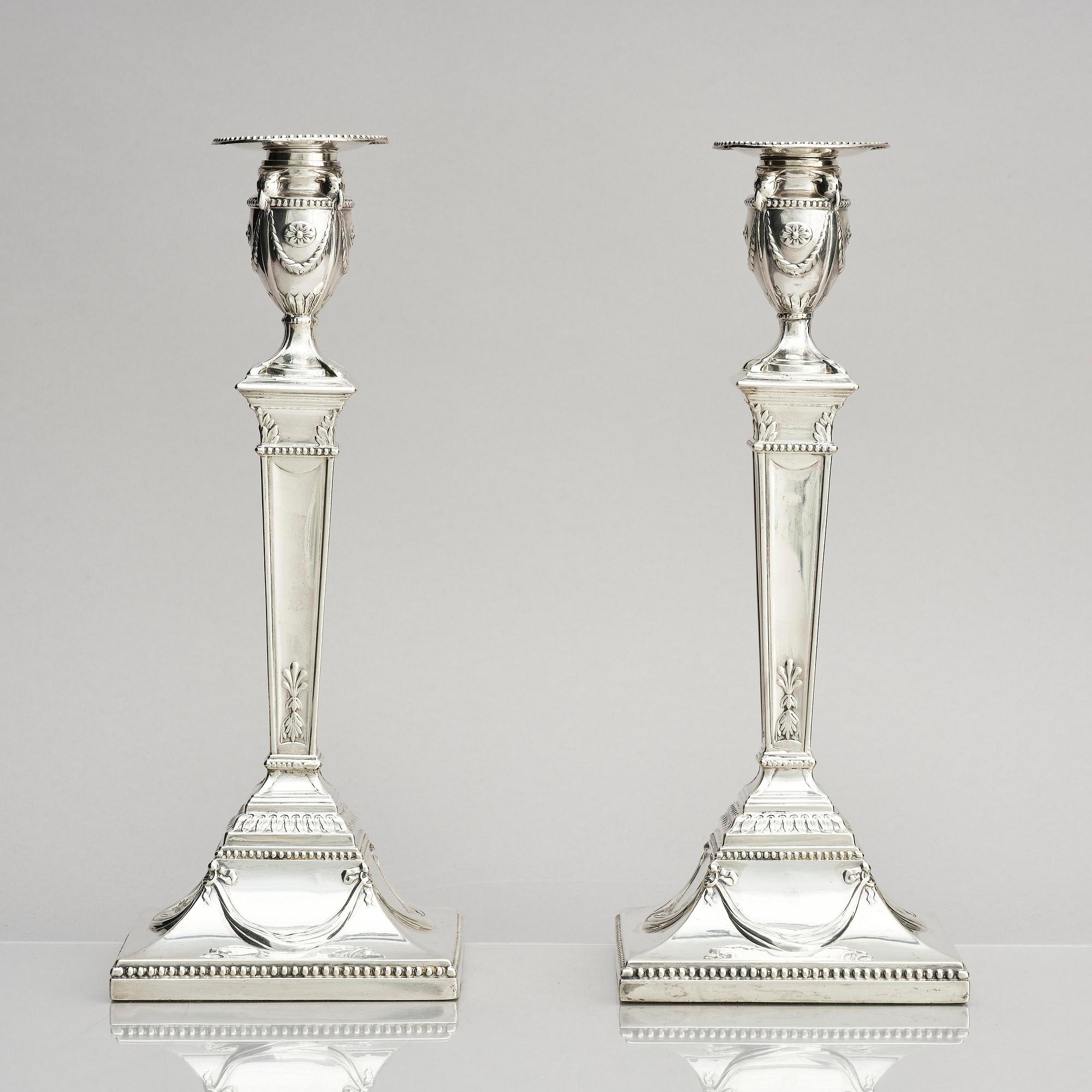 A pair of silver candlesticks, marks of John Parsons & Co, Sheffield, possibly 1784-85.