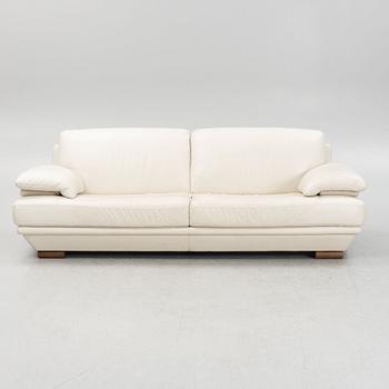 A white leather sofa, Natuzzi, Italy.