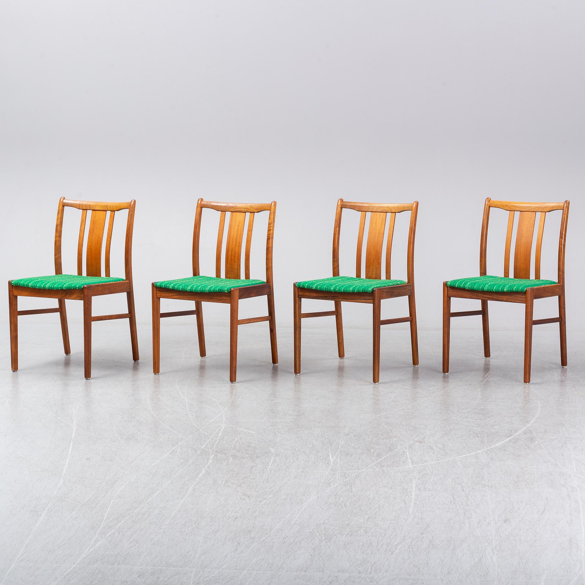 Four second half of the 20th century teak chairs.