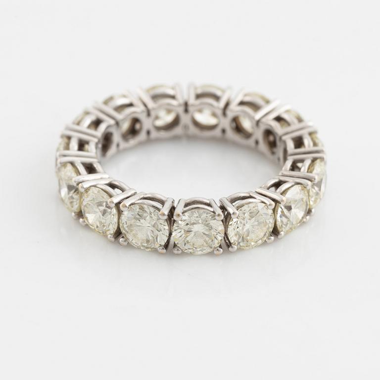 Brilliant cut diamond eternity ring.