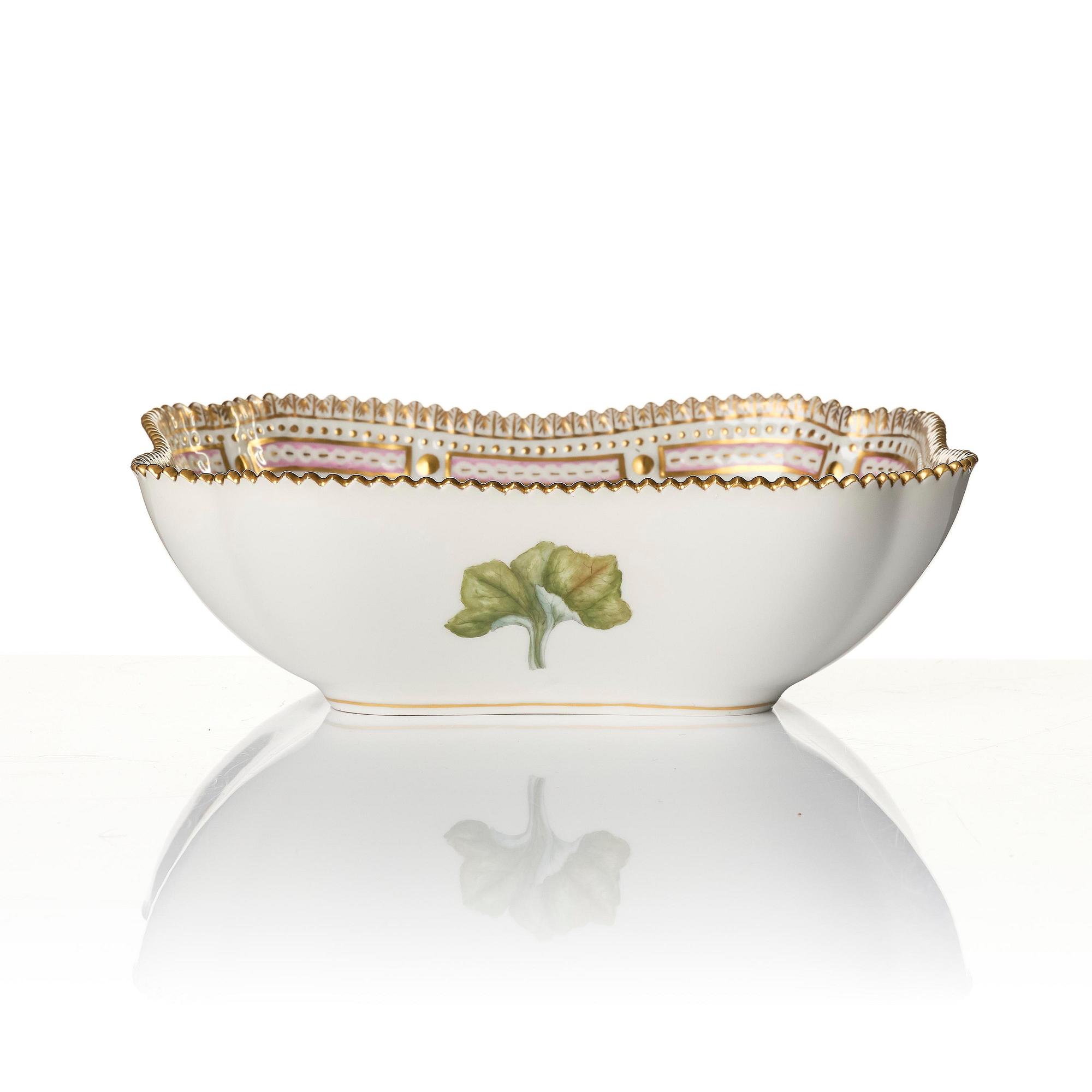 A Royal Copenhagen 'Flora Danica' sauce boat and a pillow shaped bowl, Denmark, 20th century.