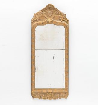 A Swedish rococo giltwood mirror, later part 18th century.