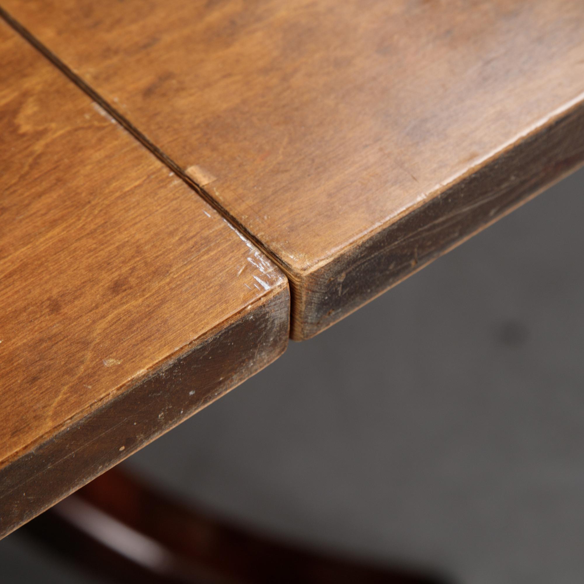 Axel Einar Hjorth, A root veneered dining table, Nordiska Kompaniet, 1938.