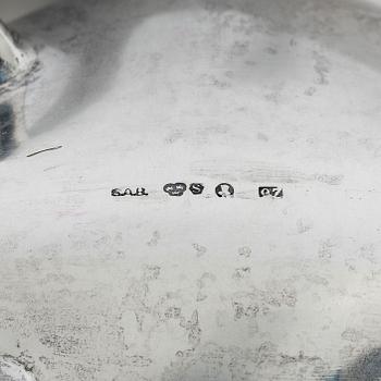 Guldsmedsaktiebolaget (GAB), A Swedish Rococo style silver coffee pot, cream jug and sugar bowl, mark of GAB, Stockholm 1918-1919.