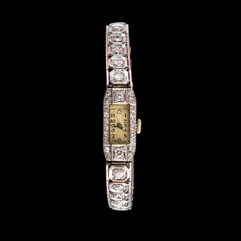 437. A JEWELLEY WATCH, Brilliant- and 8/8 cut diamonds c. 3.2 ct. Platinum. Swiss clockwork 1920 s. Weight 23 g.