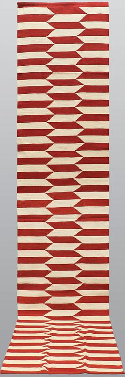 A runner, flat weave, ca 397 x 83 cm.