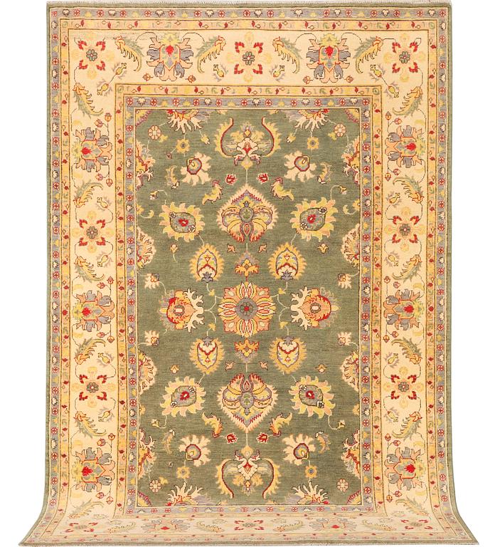 A Kazak carpet, c. 304 x 195 cm.
