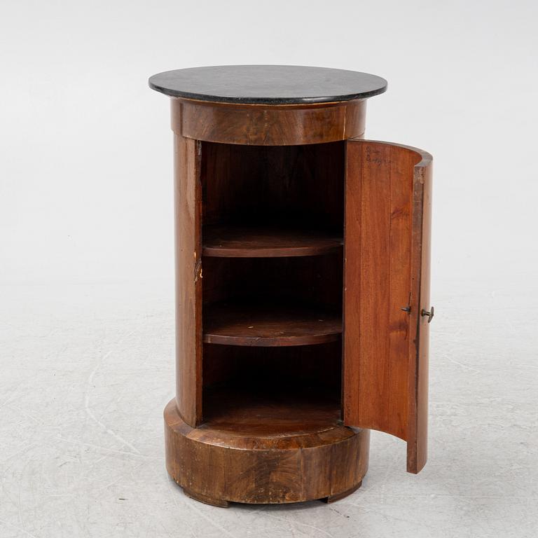 A mahogany veneered cabinet/bedside table with stone top, 19th Century.