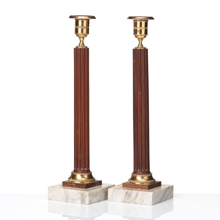 A pair of late Gustavian late 18th century candlesticks.