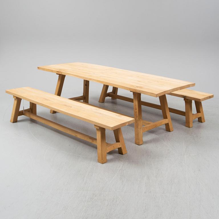 A contemporary oak table and two benches from Garbo Interiors.