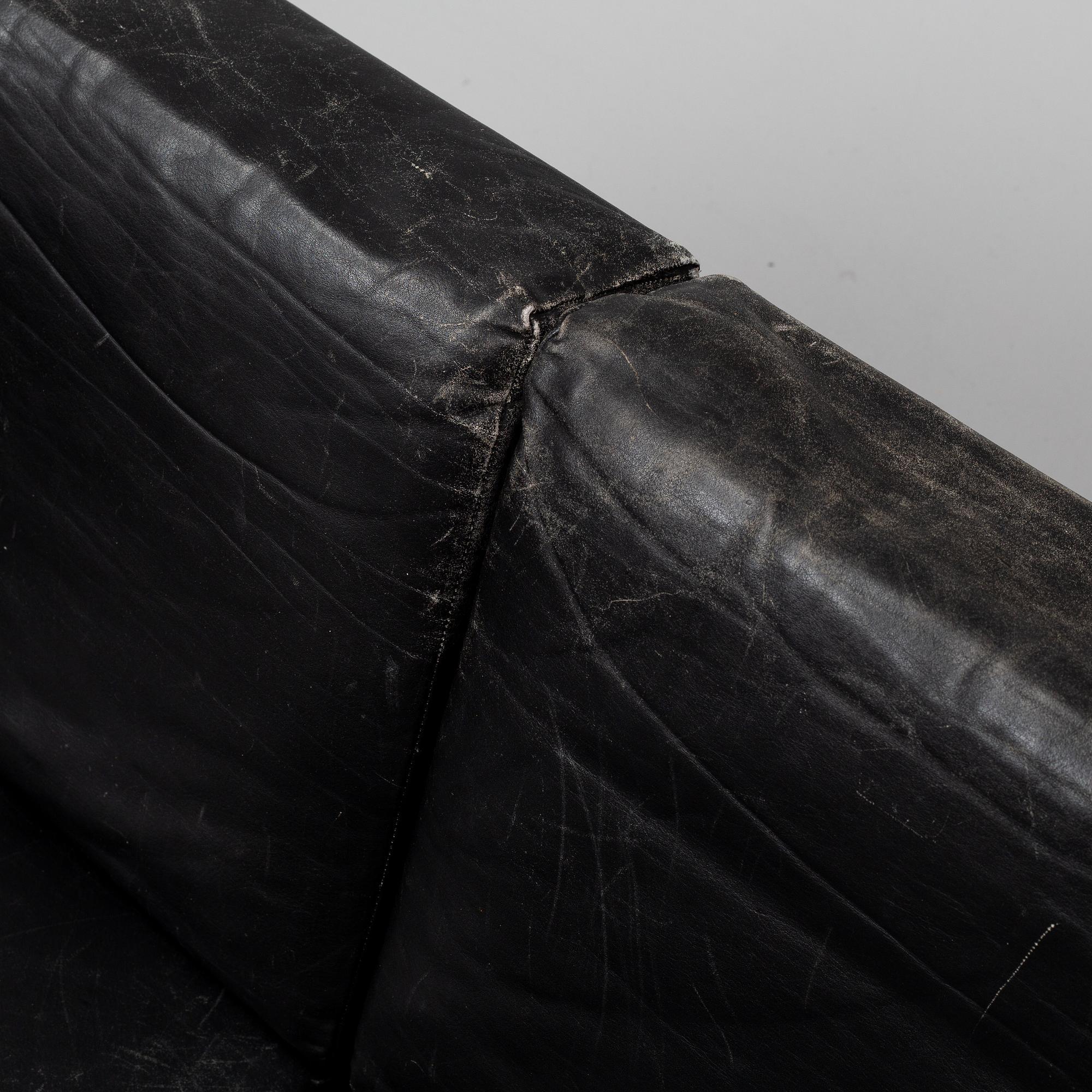 A 1960's leather covered sofa.