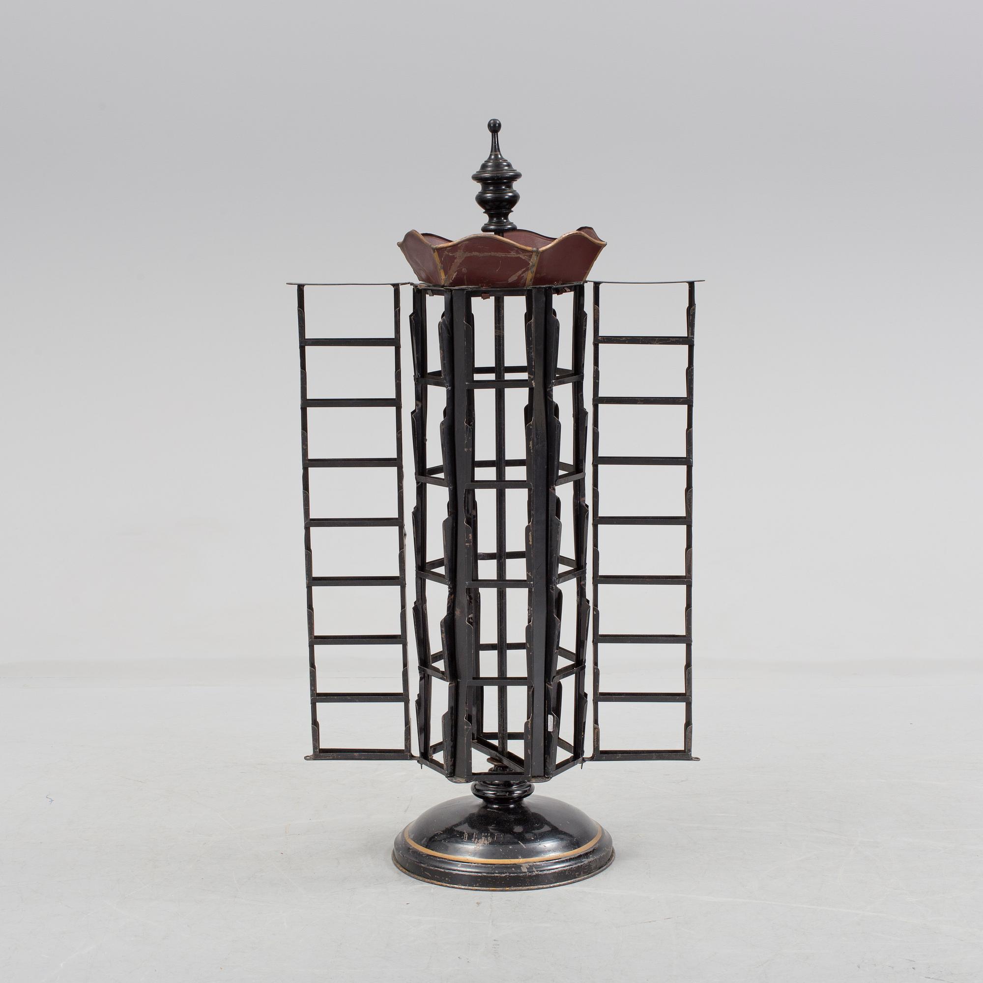 A postcard stand, circa 1900.