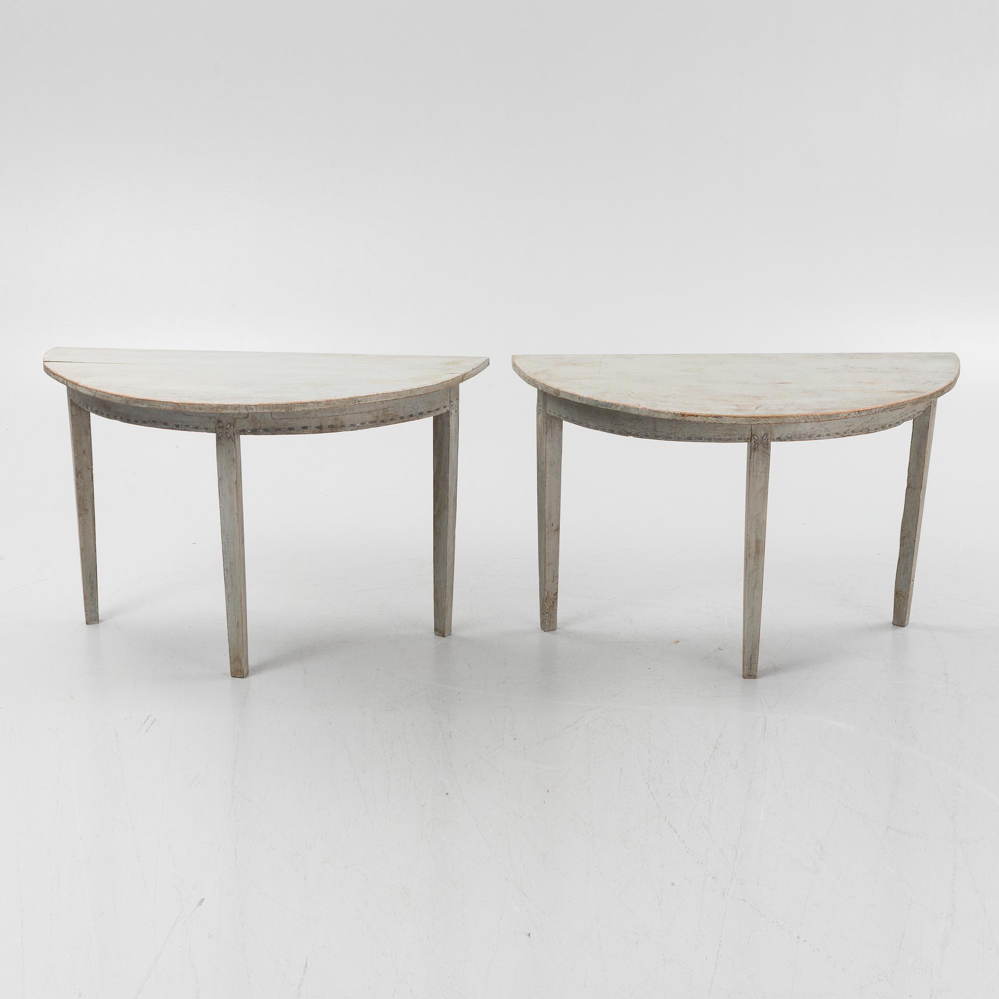 A painted pair of side tables, 19th Century.