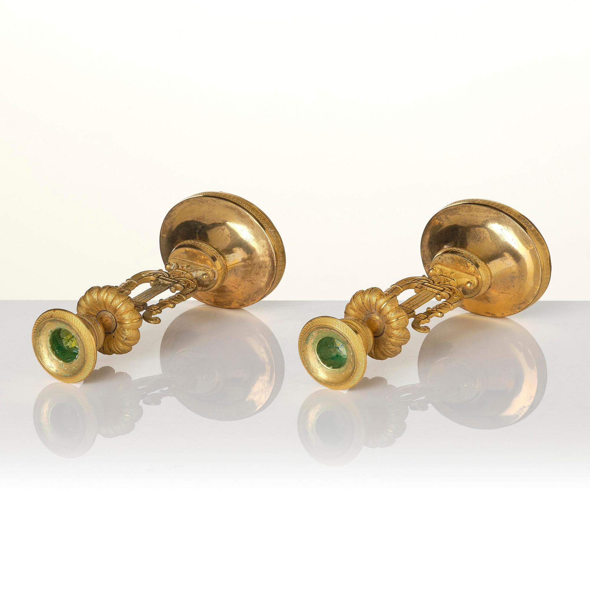 A pair of Swedish Empire ormula candlesticks.