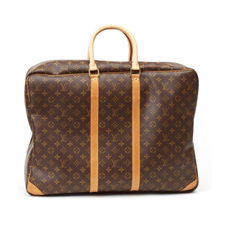 A 1998s monogram canvas travelling bag "Sirius" by Louis Vuitton.