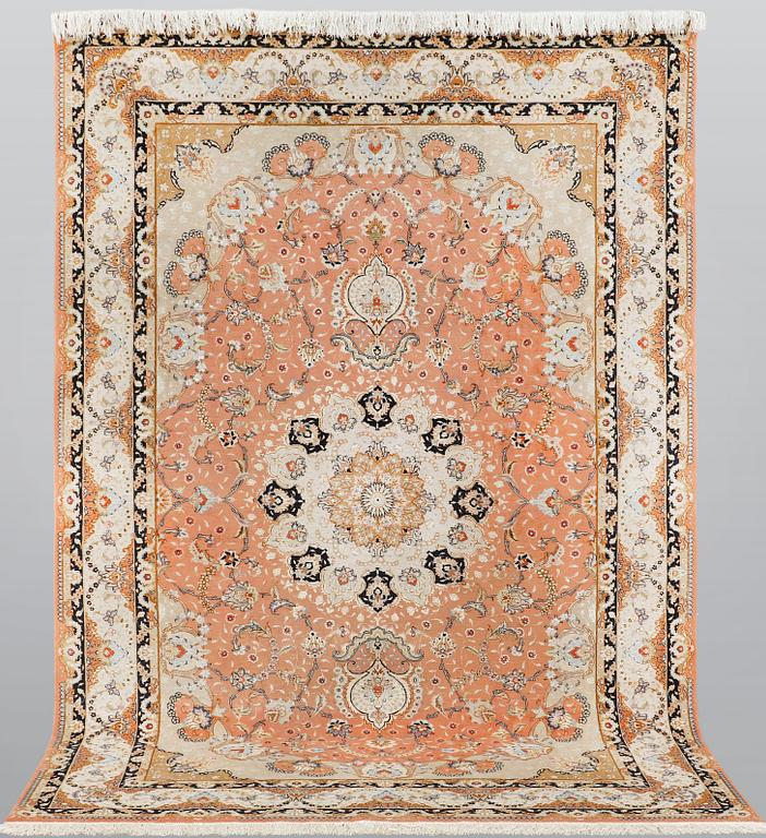 A part silk Tabriz carpet, so called 50 Raj, c 301 x 200 cm.