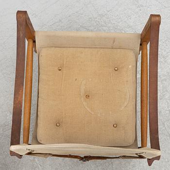 Kaare Klint, A pair of 'Safari' armchairs, Rud. Rasmussen's Snedkerier, Denmark, second half of the 20th century.