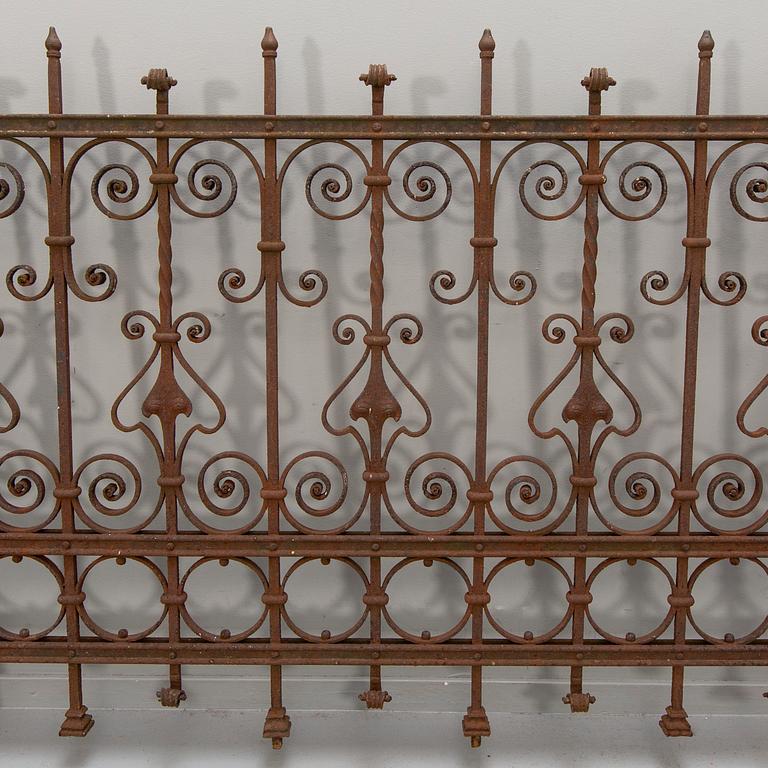 A cast iron two part fence around 1900.