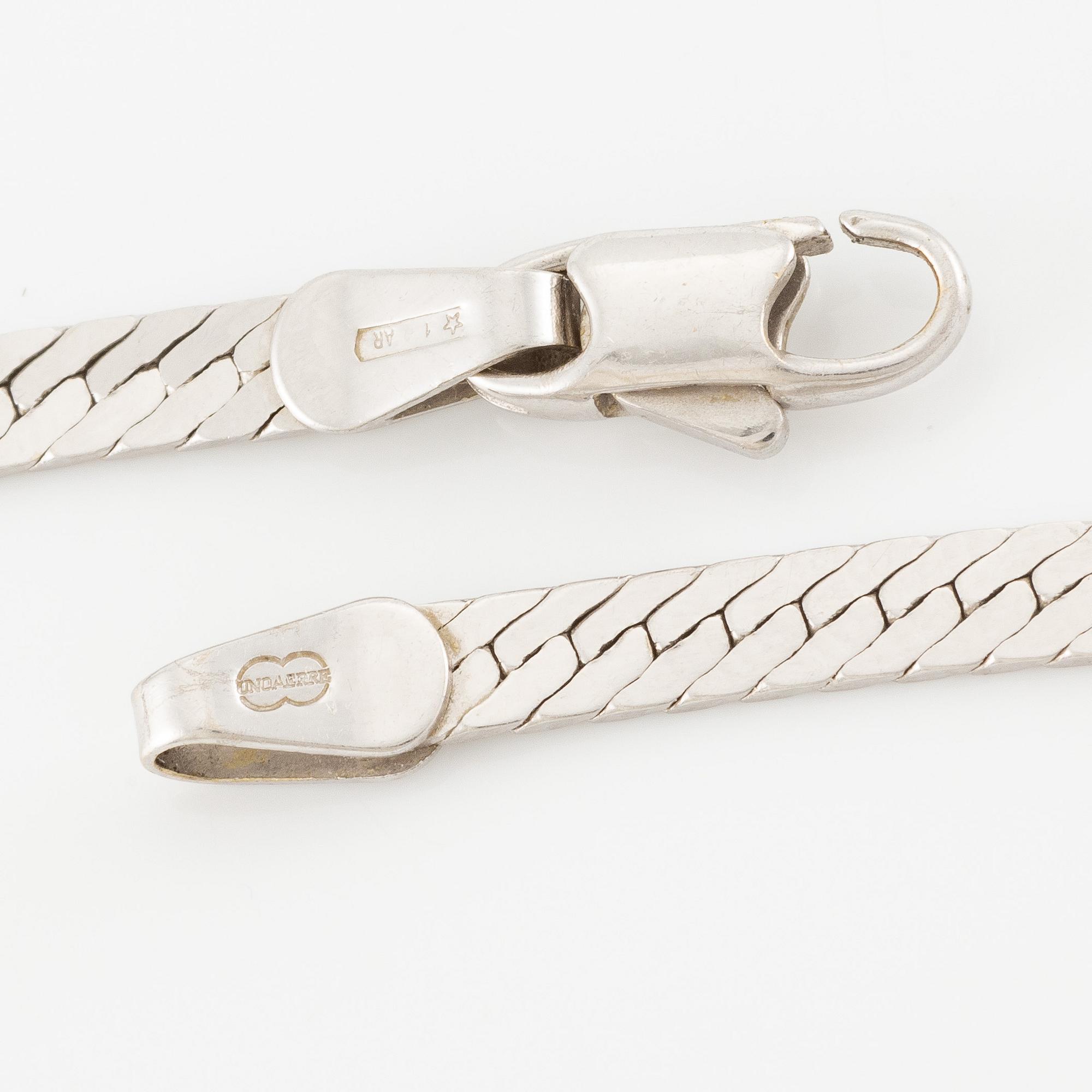 Necklace, 14K white gold with baguette-cut, brilliant-cut, and marquise-cut diamonds.