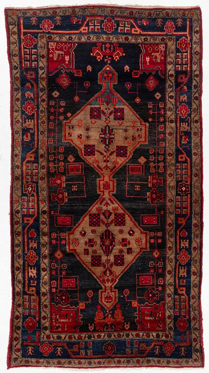 An Oriental rug, c. 282 x 154 cm.