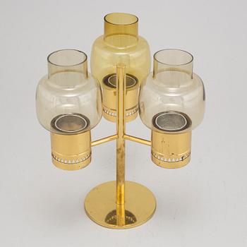 Hans-Agne Jakobsson, a modell L67 brass and glass three-light candelabra from Markaryd.