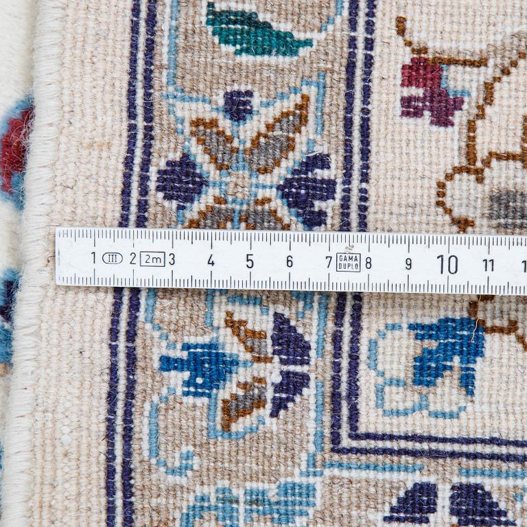 A carpet, Nain, part silk, ca 296 x 192 cm.