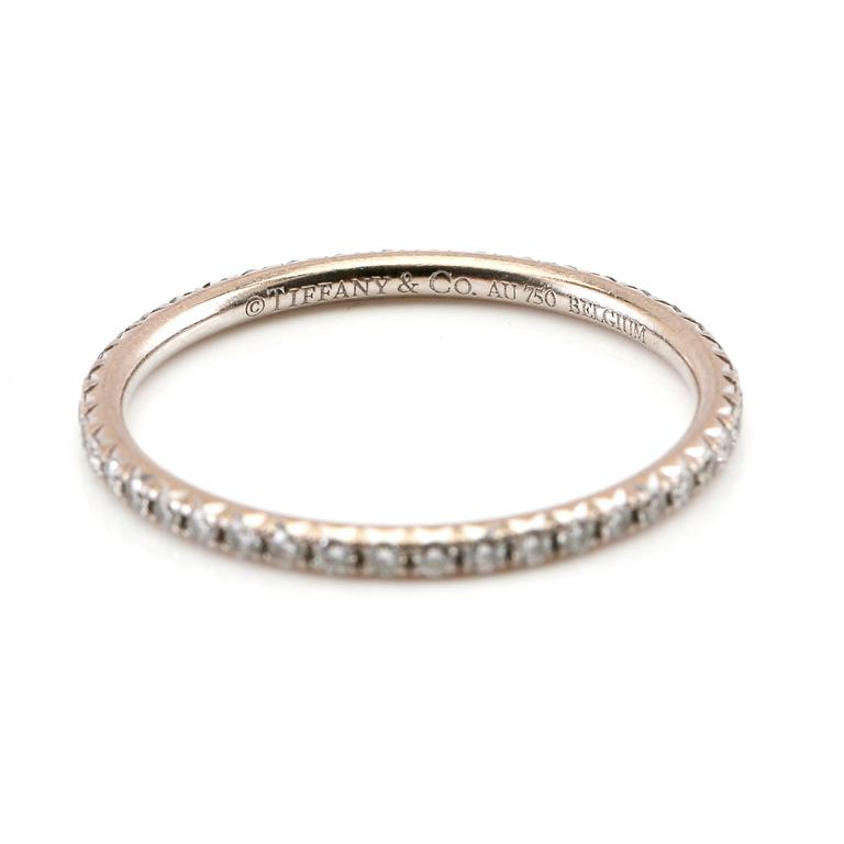 Tiffany & Co, "Metro Ring" full eternity ring in 18K white gold with round brilliant-cut diamonds.