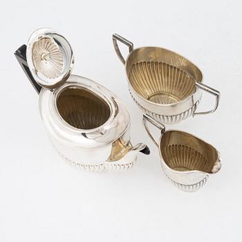A three piece silver tea service, Birmingham, England, 1909.