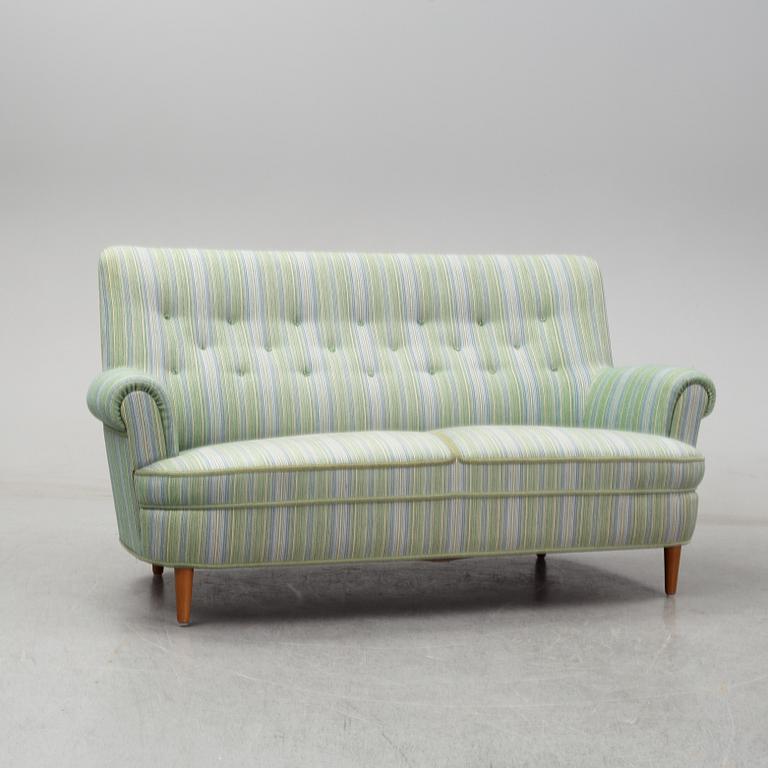 A second half of the 20th Century sofa by Carl Malmsten.