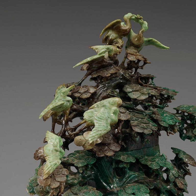 A large, Chinese carved jade pine tree with birds, 20th Century.