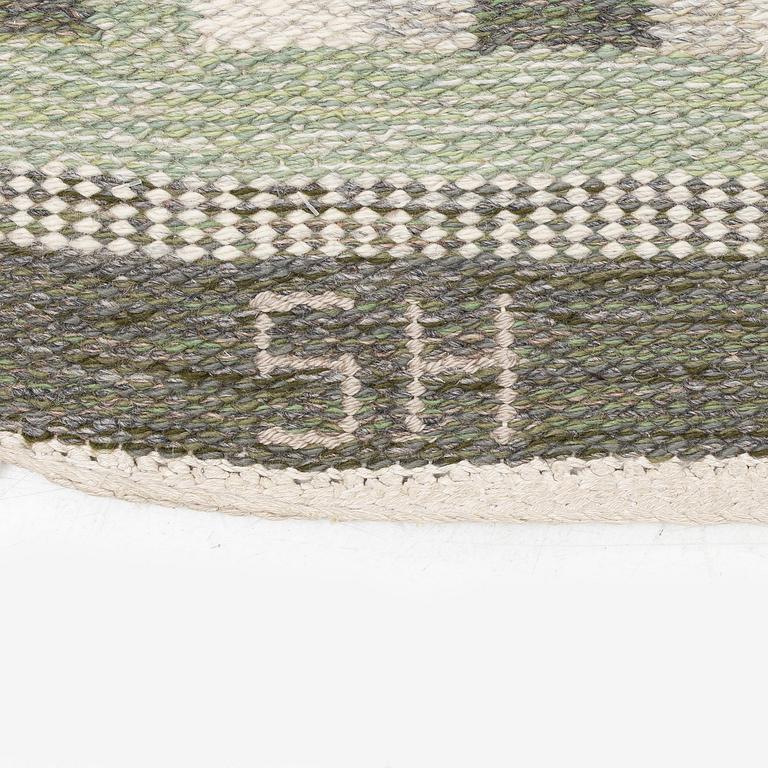 Edna Martin, a flat weave runner, c. 335 x 104 cm signed SH EM.