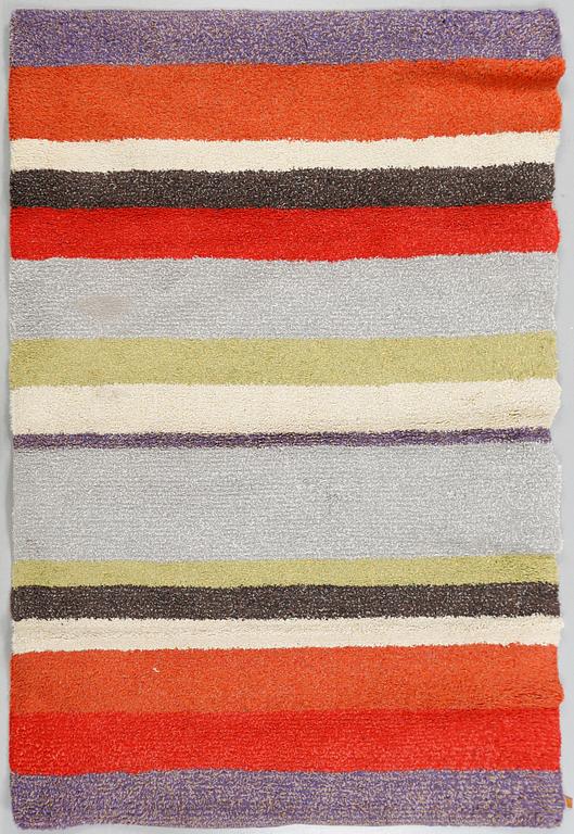 A carpet named "Stubb", designed by Gunilla Lagerhem-Ullberg for Kasthall, around the year of 2000.