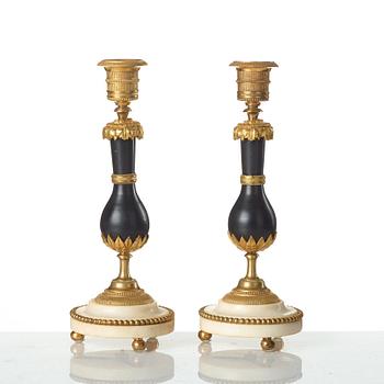 A pair of Louis XVI late 18th century candlesticks.