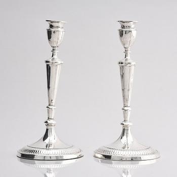 A pair of 18th century silver candlesticks, marks of John Parson & Co, Sheffield 1791.