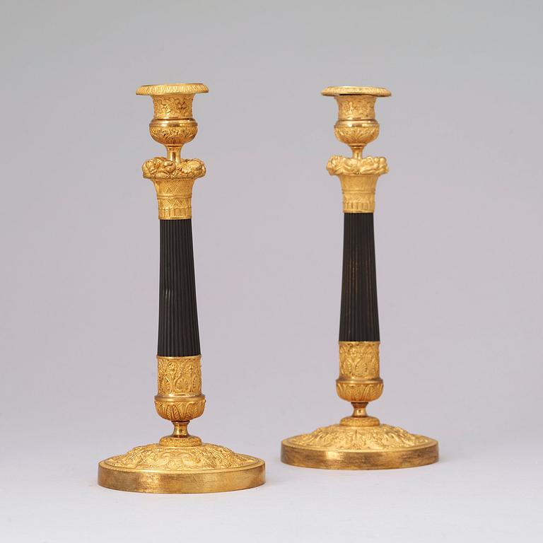 A pair of French Empire 19th century candlesticks.