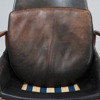 An Ib Kofod Larsen 'Sälen' teak and black leather armchair, OPE, Jönköping, Sweden 1950's-60's.