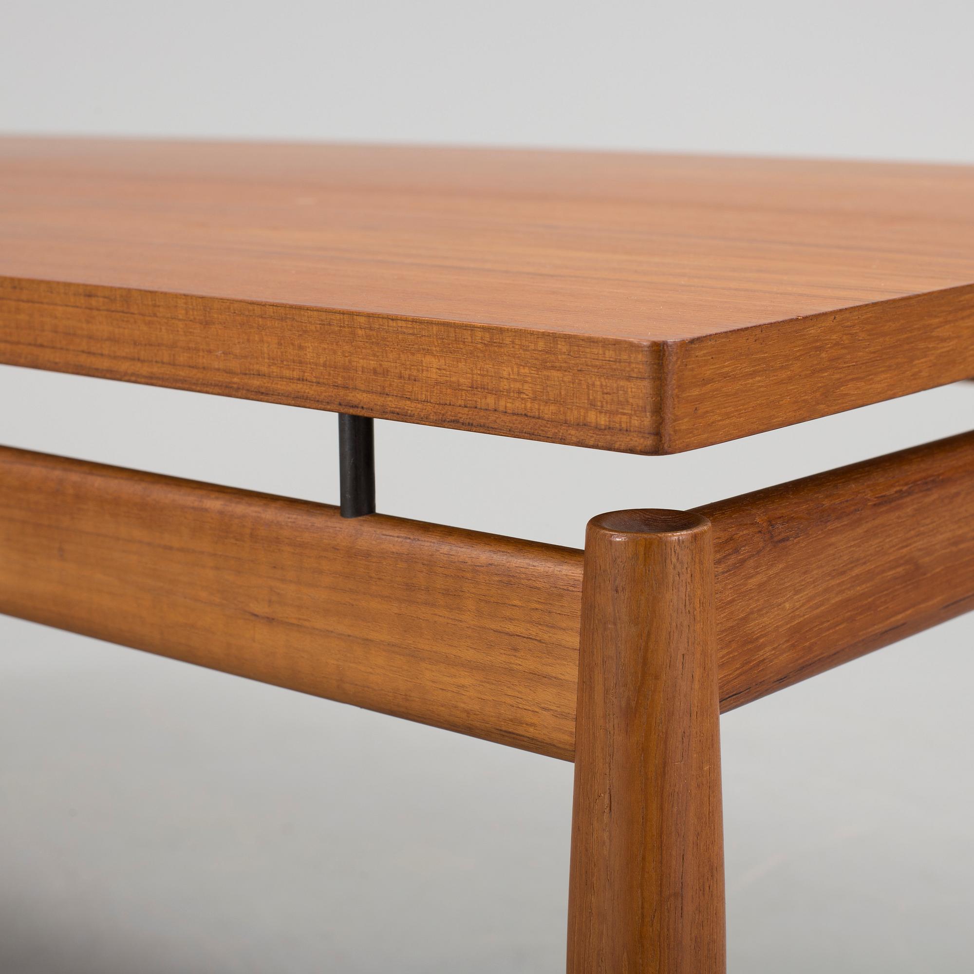 GRETE JALK, a teak coffee table fron France, Denmark, 1963.