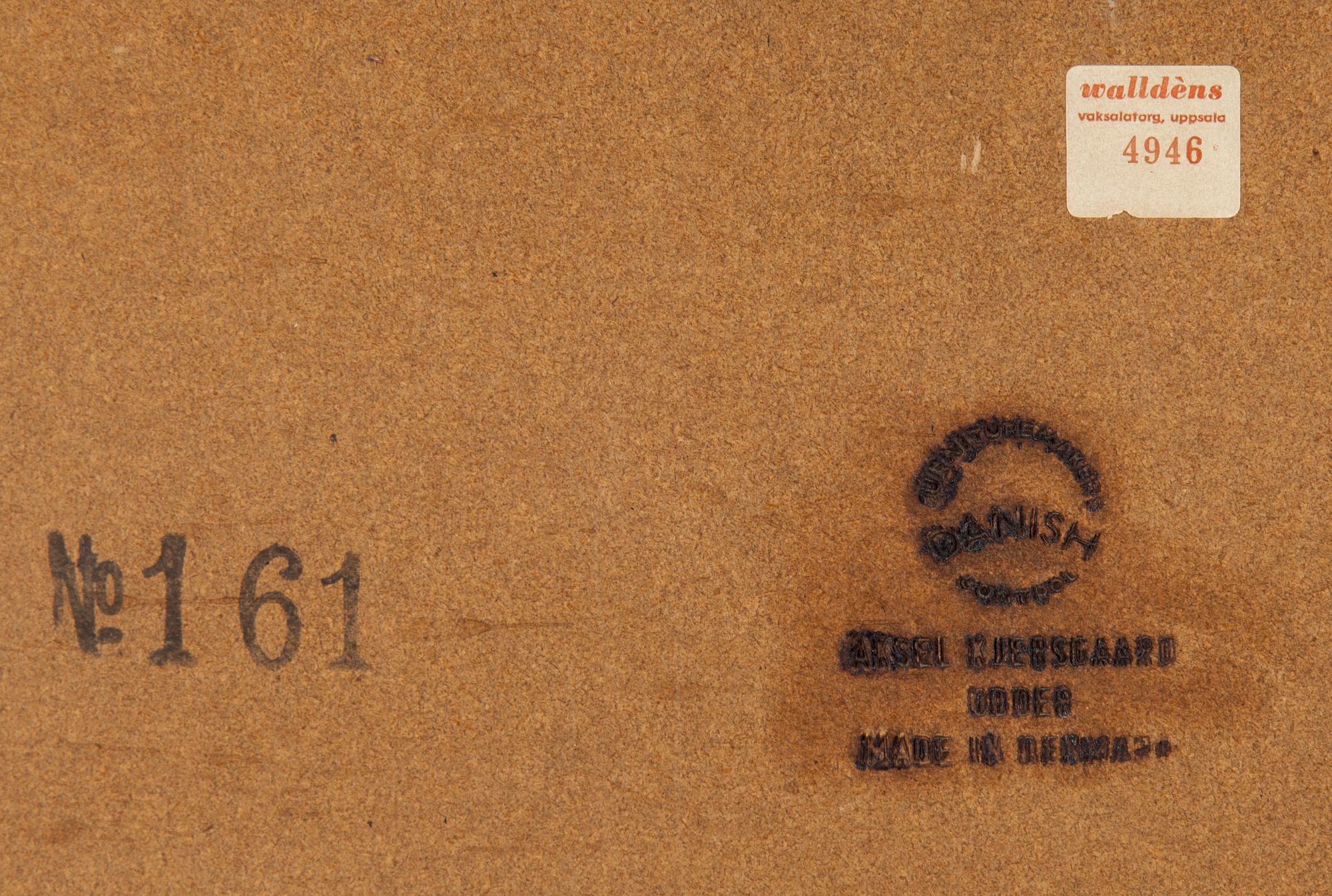 A teak mirror by Aksel Kjersgaard, Odder, Denmark.