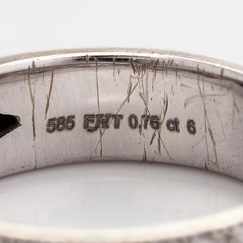 A 14K white gold ring with diamonds.