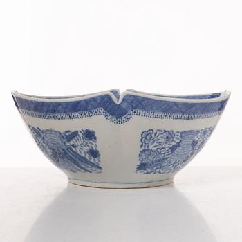A group  of three serving dishes, a serving bowl, a cup, and seven plates, porcelain, including China 18th century.