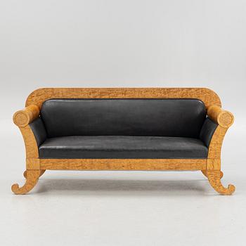 An Empire sofa, first half of the 19th century.