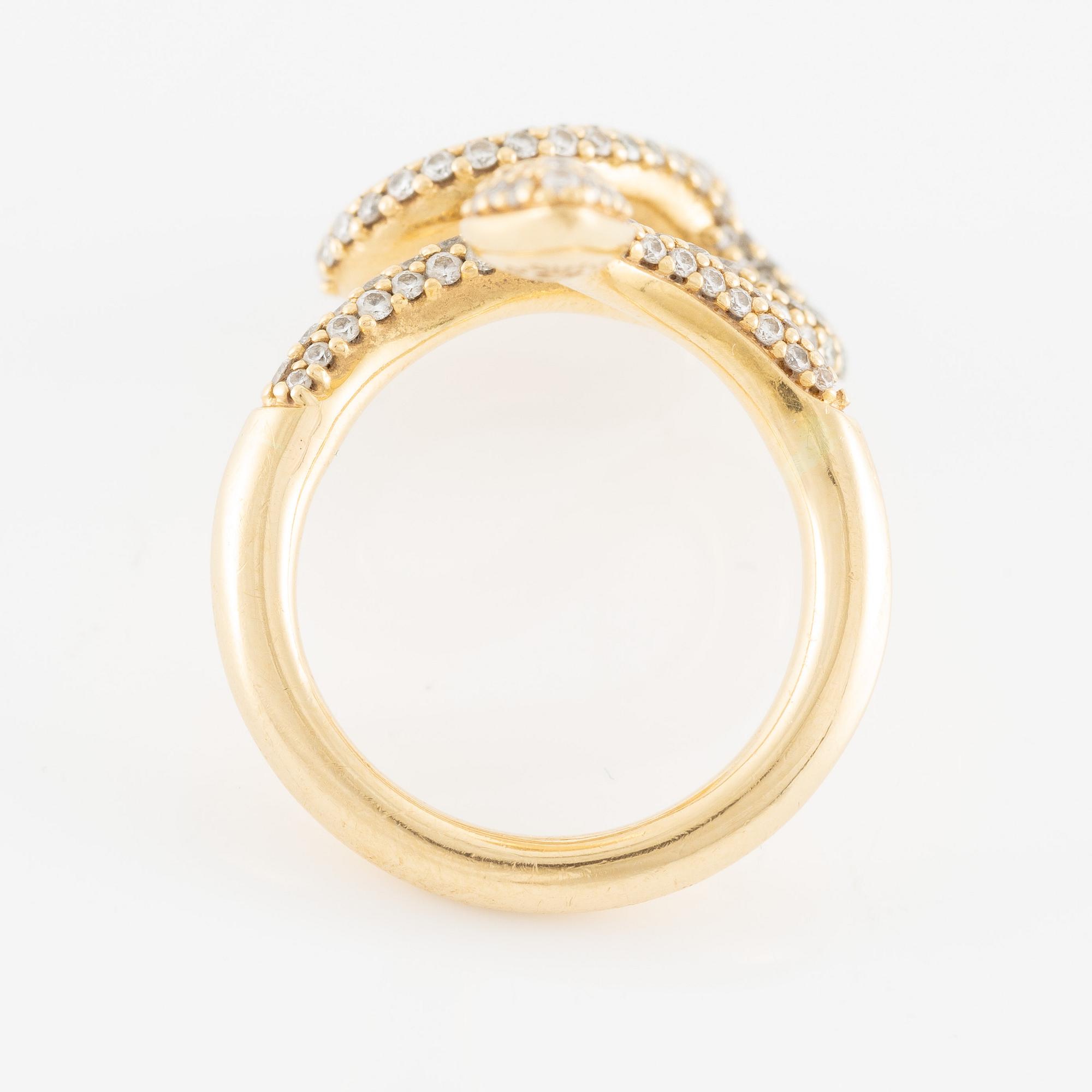 Ole Lynggaard, "Snakes ring" 18K gold with brilliant-cut diamonds.